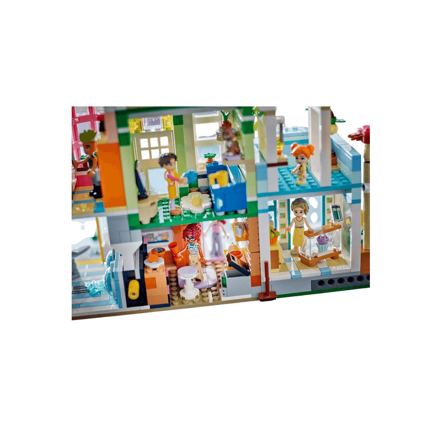 LEGO Friends Zestaw Mieszkania i sklepy w mieście Heartlake 42670